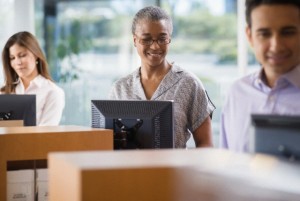 Bank employees at counter