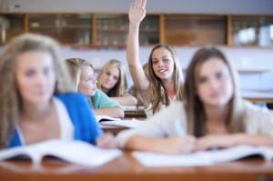 School girls enjoying science lesson